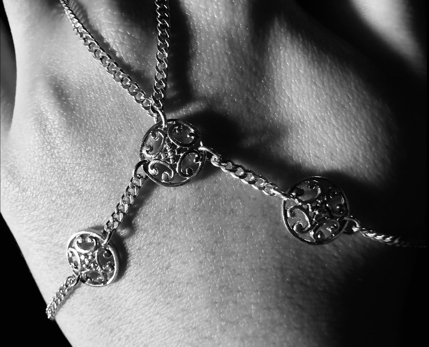 Three small ornament hand chain